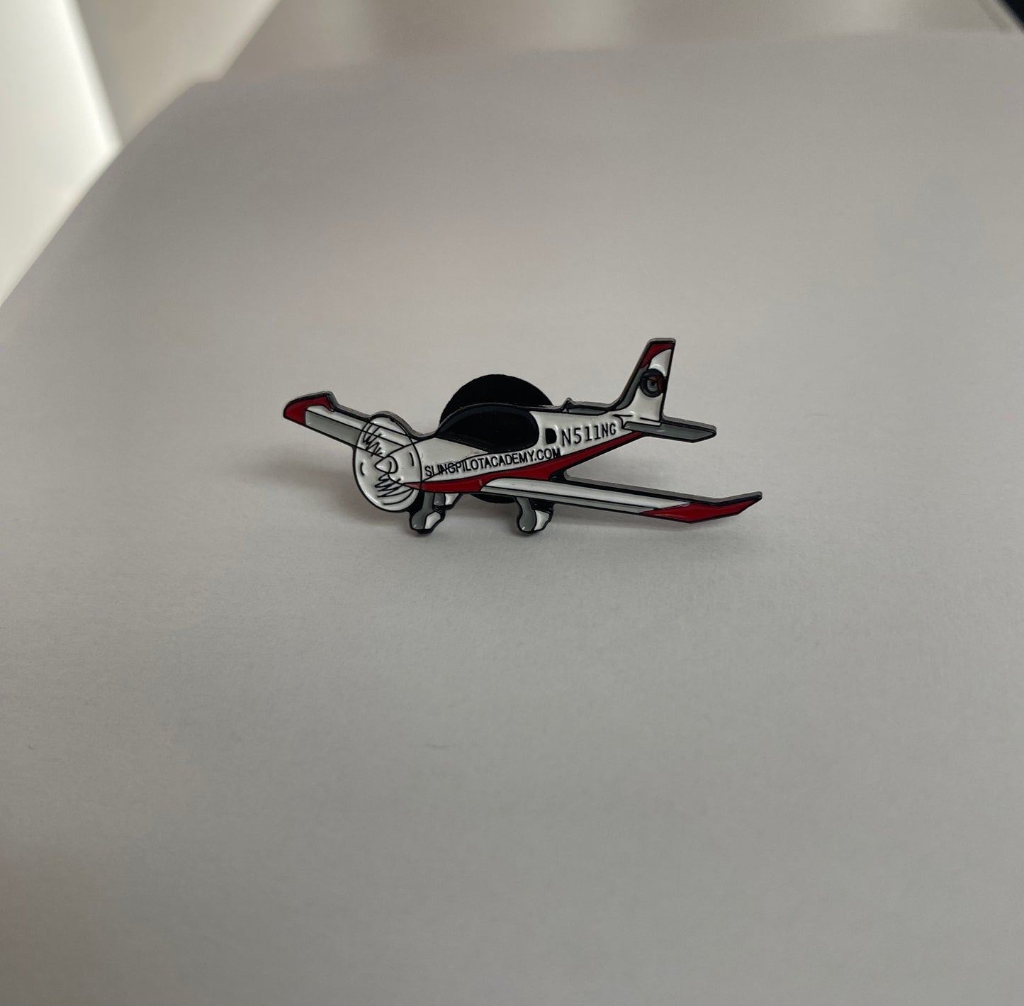 Sling Enamel Pin